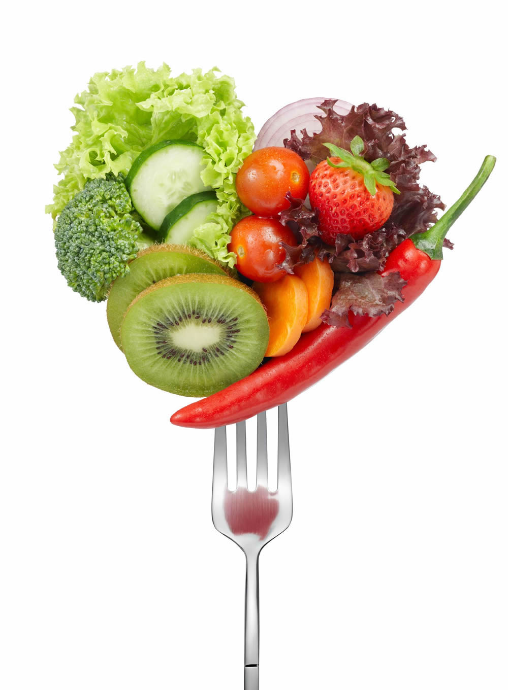 Fresh fruit and vegetables on a fork